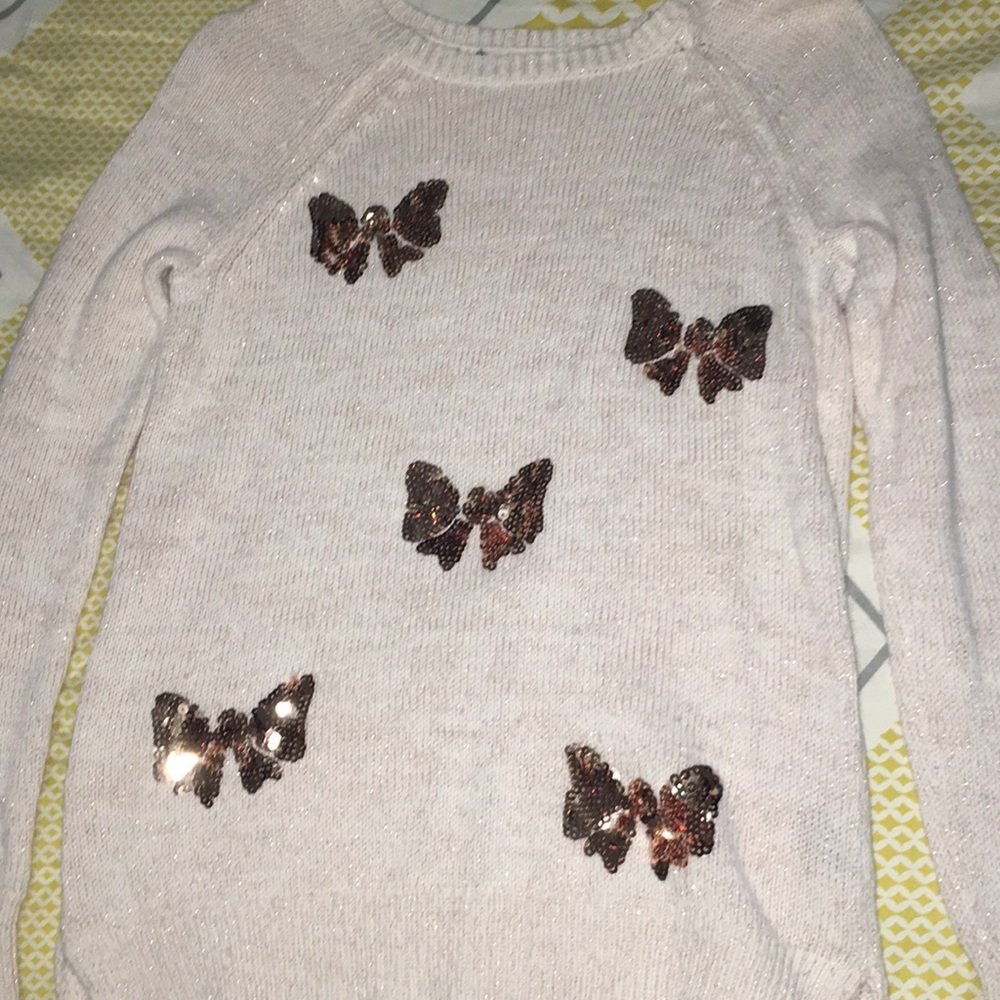 Sequins design sweater/shirt.